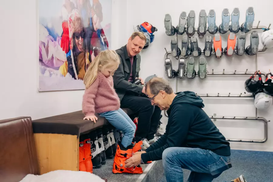 Fitting ski boots for a young guest